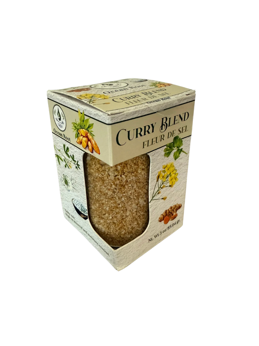 A White box with a jar of Fluer de Sel with Curry Sea Salt