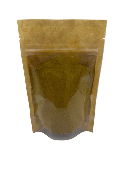 Brown powder in a clear plastic bag with a Golden Milk mix of spices.