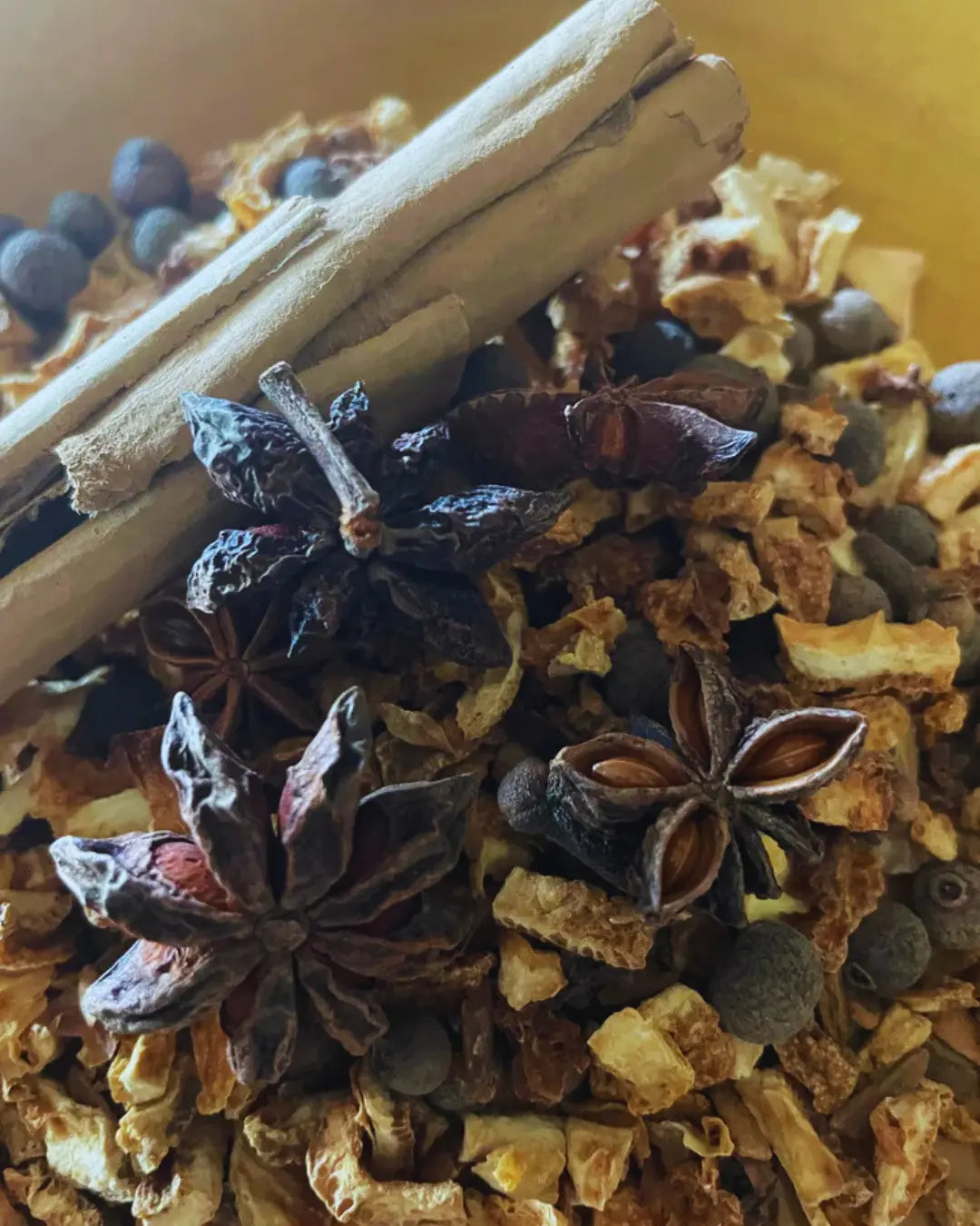 Spice blend mix with cinnamon sticks, star anise, dried citrus and whole allspice