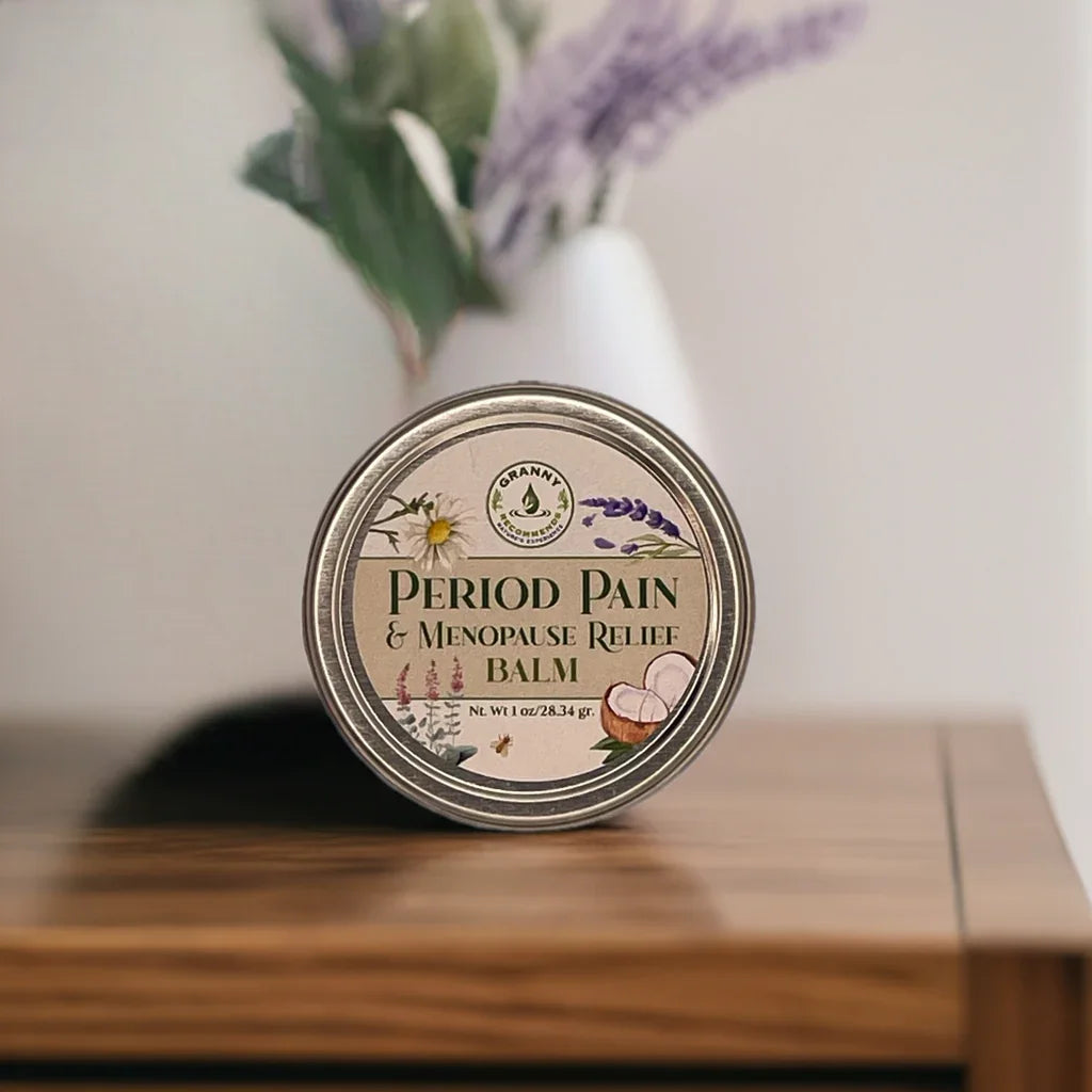Herbal period pain and menopause relief balm tin on wooden table with lavender decor